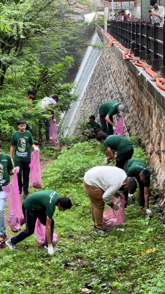 Volunteers Cleaning Water Dam Slope